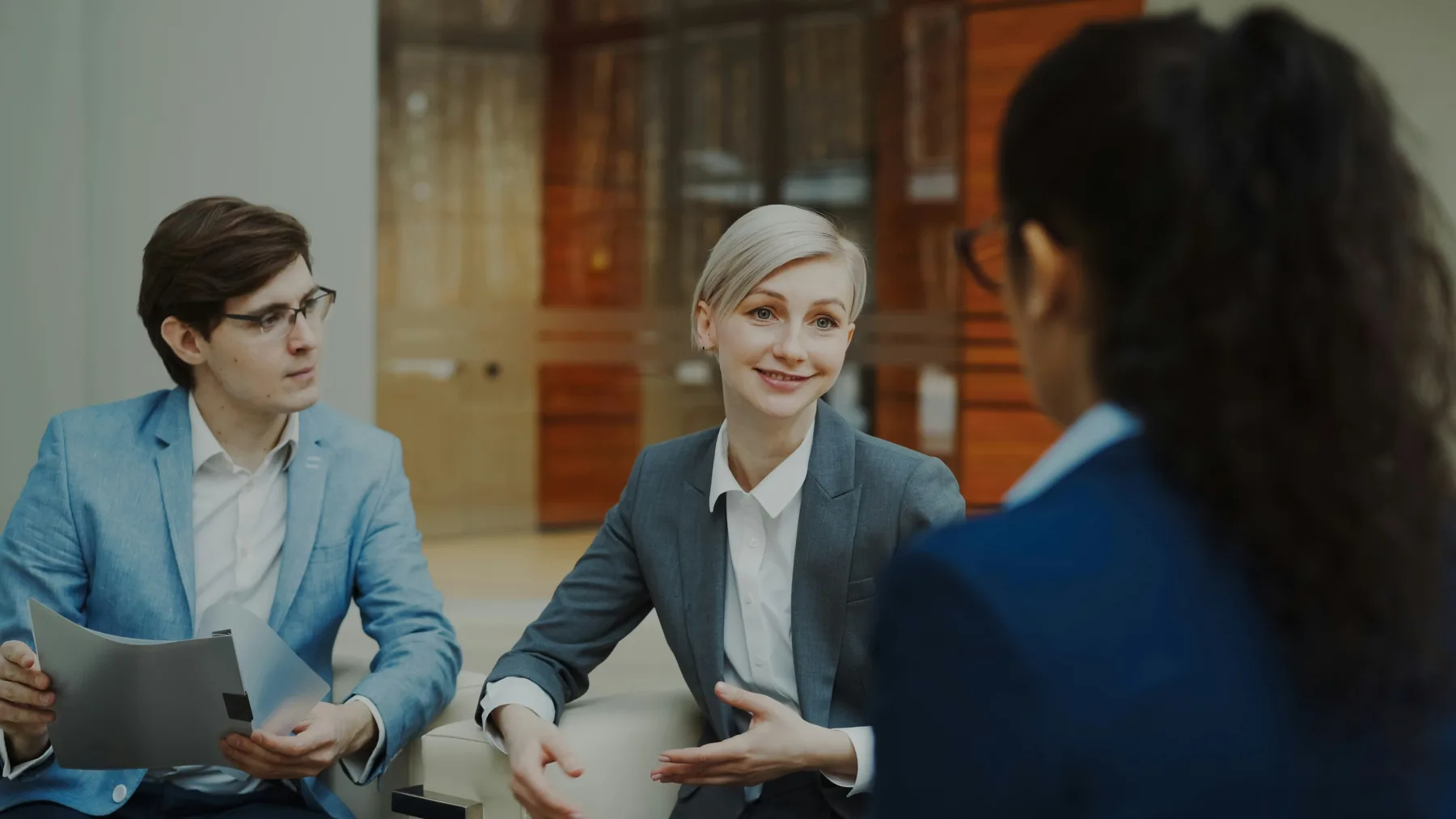 Business team reviewing documents during a consultation